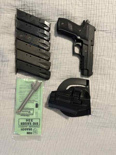 Sig P226 .40, plus extra barrel and magazines