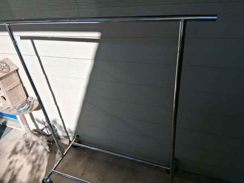 Adjustable Height Rolling Clothing Rack $50.00
