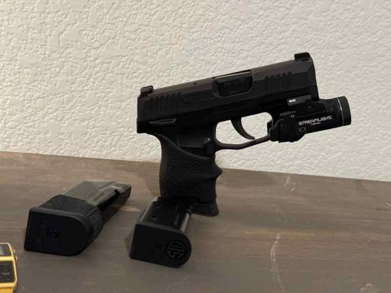 Sig Sauer P365 w/ TLR7 light, mags, thumb safety