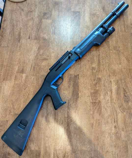 Benelli M1 with Surefire 