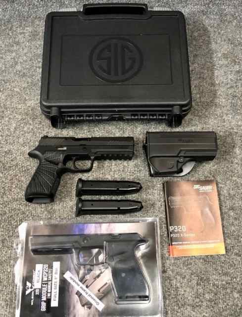 Sig Sauer P320 9mm pistol with Wilson frame