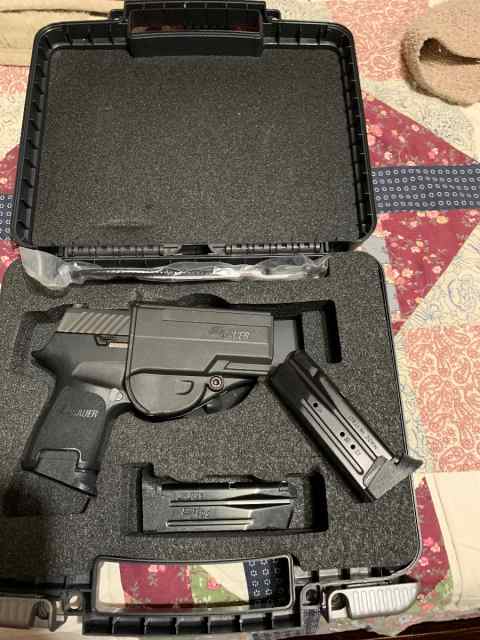 Sig. p320. 9 mm    4 mags and holster 